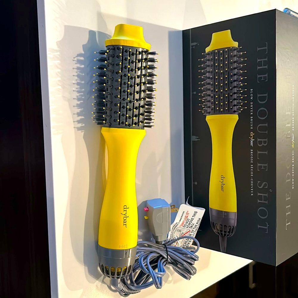 Brand new Dry Bar Double Shot blow dryer brush. Come with box and instructions.